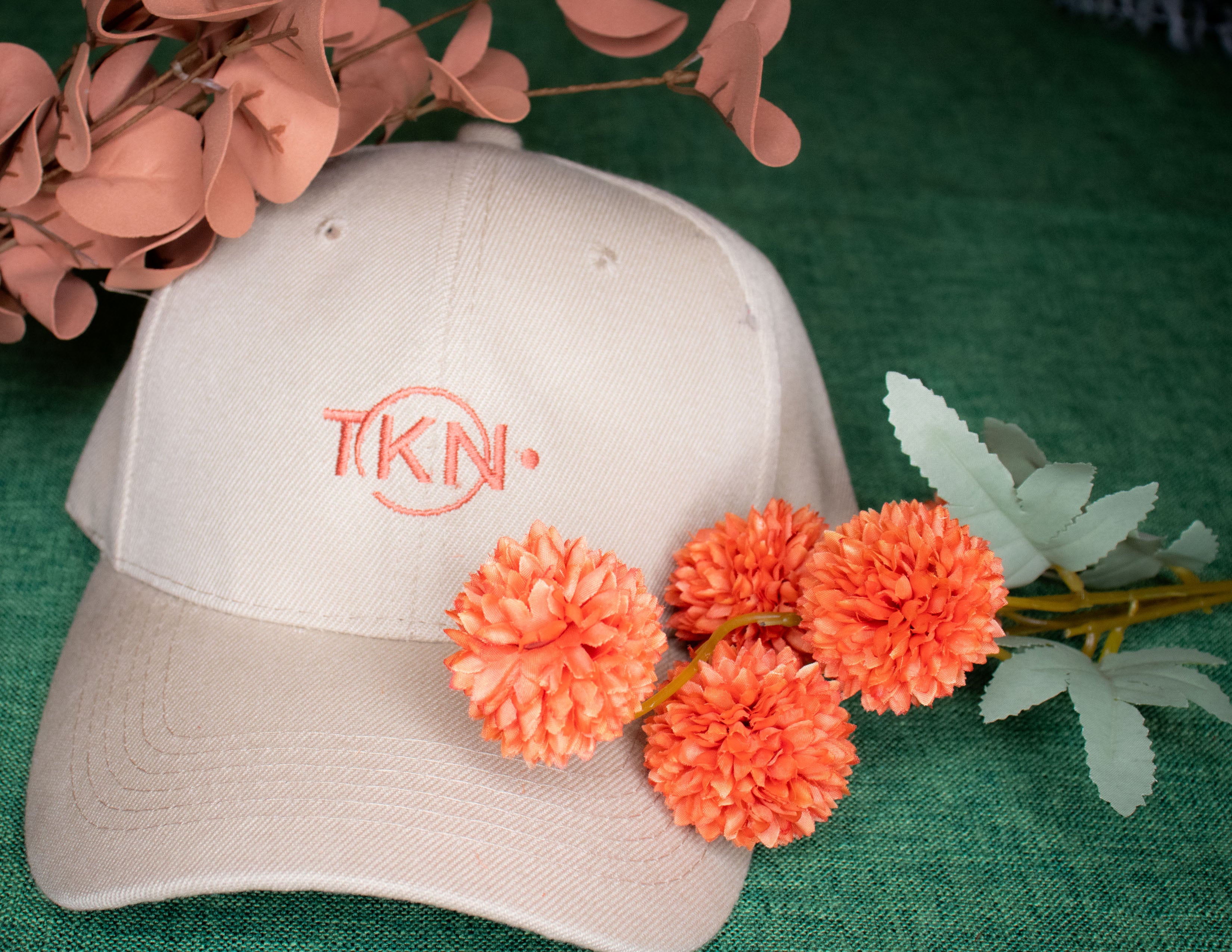 TKN CAP